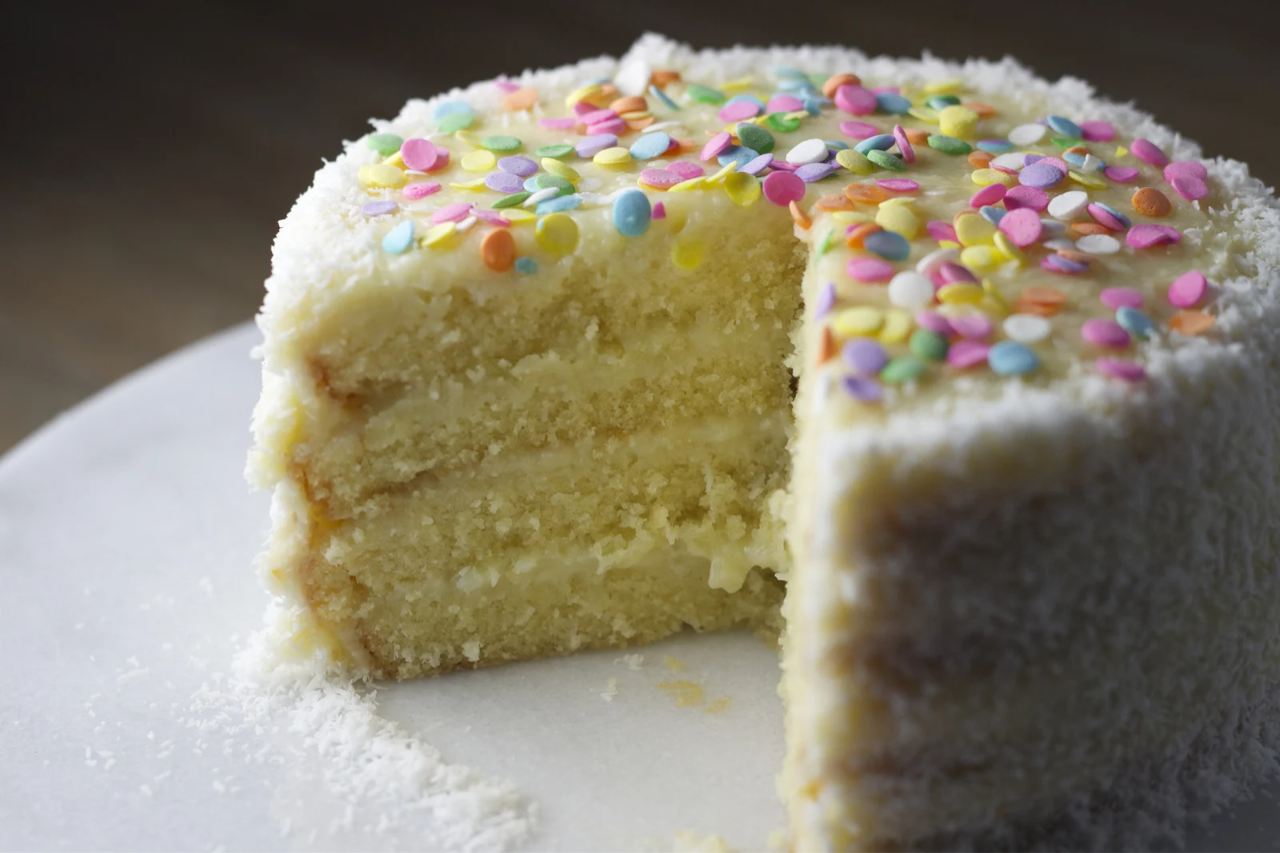 Image of birthday cake with a slice missing