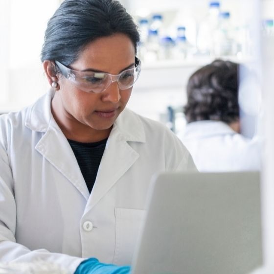 scientist-on-laptop-in-lab